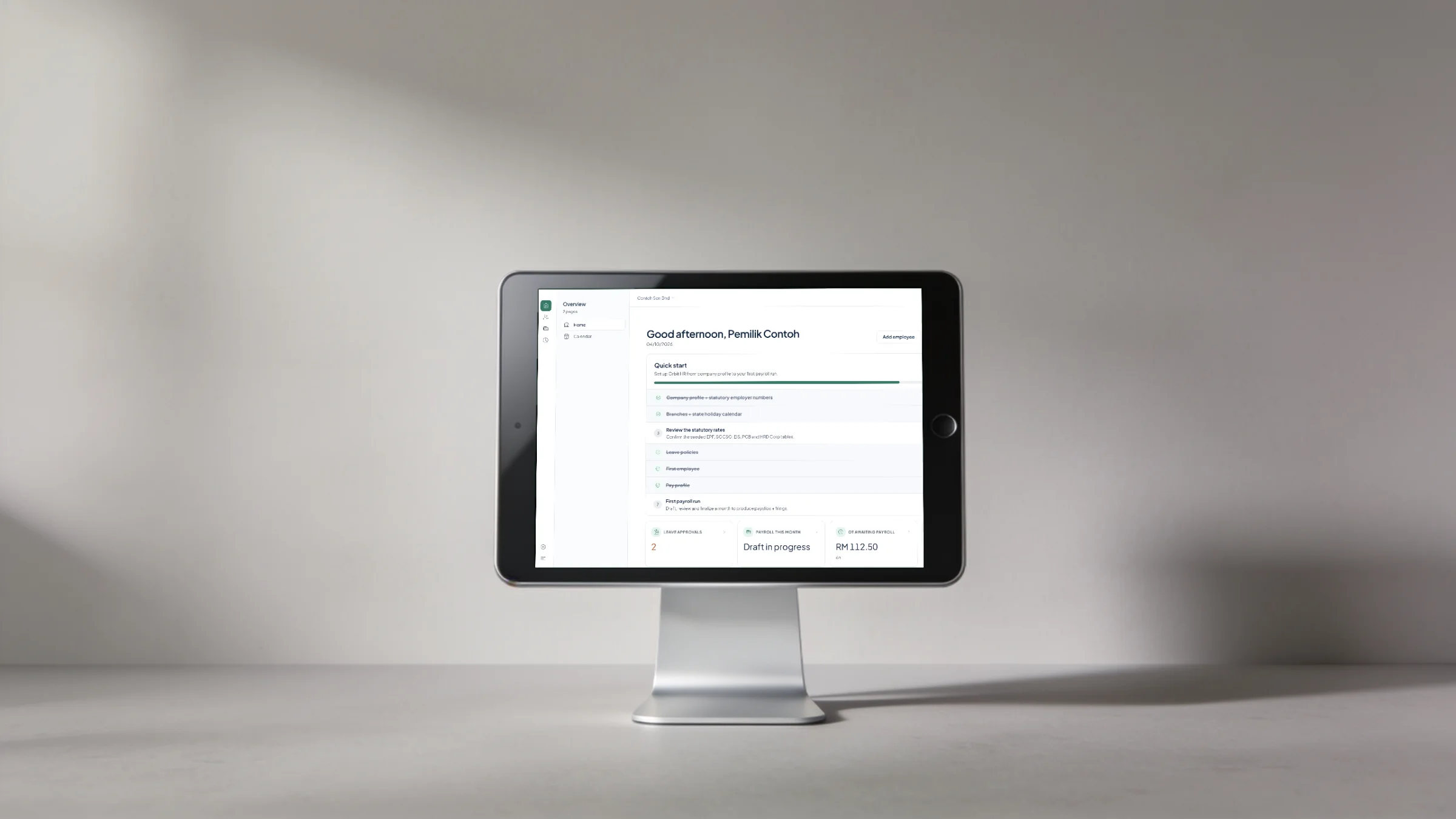 A tablet on a stand showing the Orbit HR home with its quick start checklist